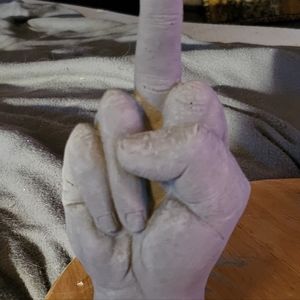 Middle finger statue (cement unpainted)